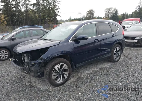 2016 Honda Cr-V Touring z USA, uszkodzony, nr VIN 5J6RM4H98GL055109